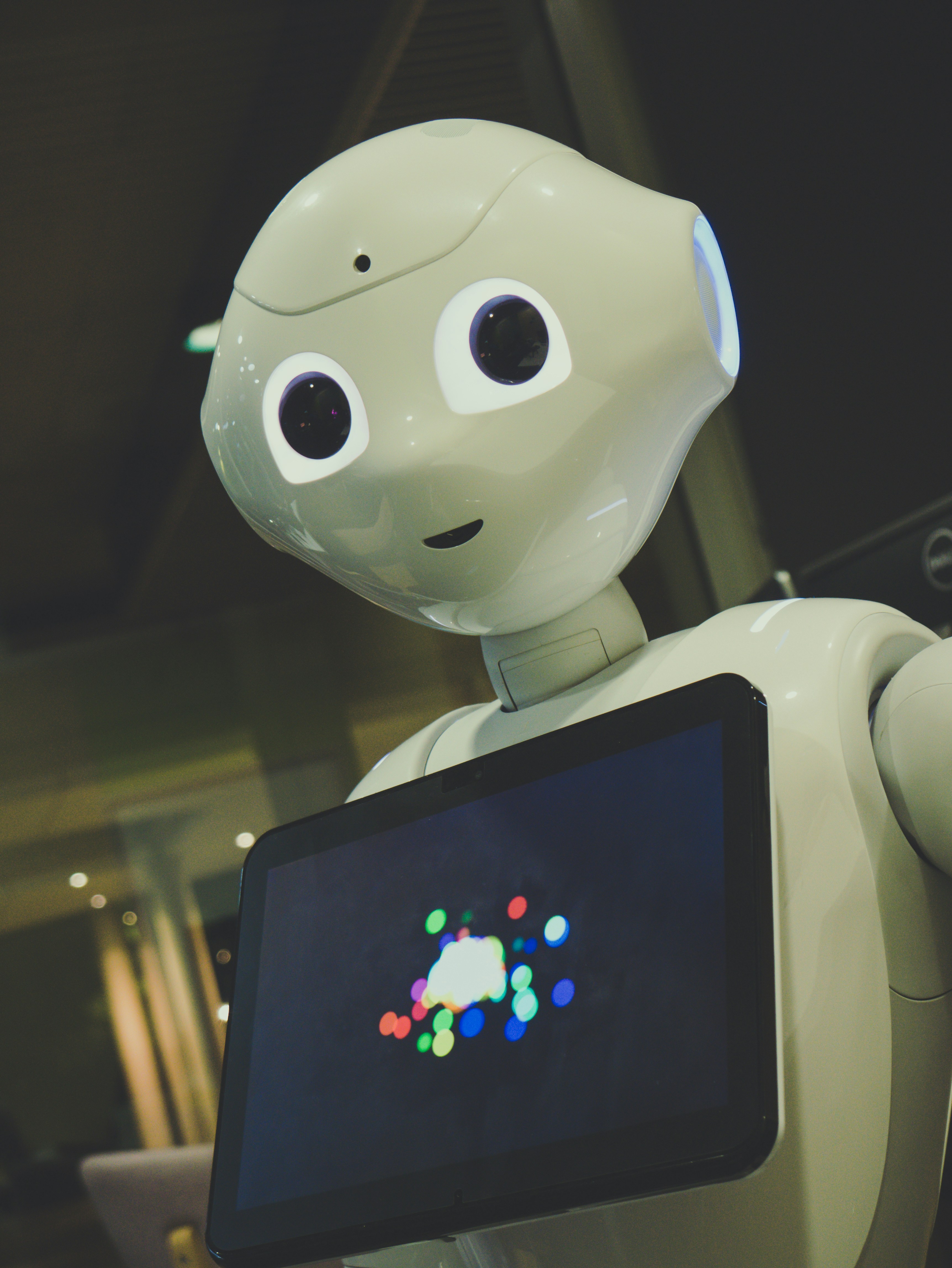 Humanoid robot with display screen - representing AI technology
